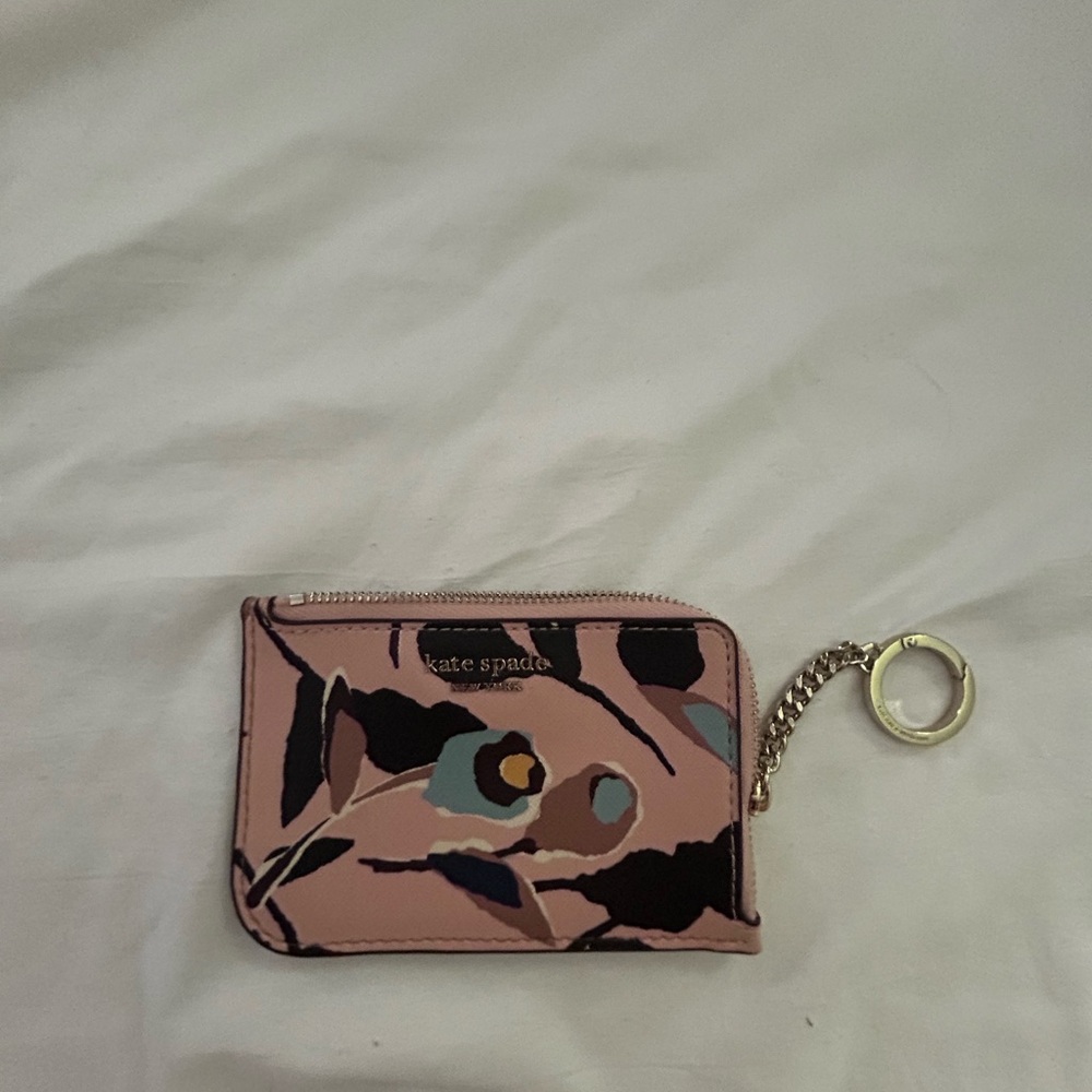 Kate Spade card holder really good condition used once or twice.